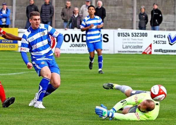 Aaron Taylor scores Lancaster City's opening goal. Picture: Tony North.