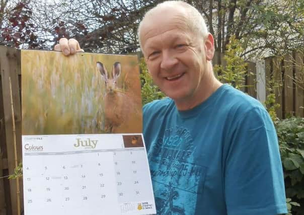 Andy Stewart has won a prestigious photographic honour by having one of his photos chosen for the 2016 BBC Countryfile calendar.
