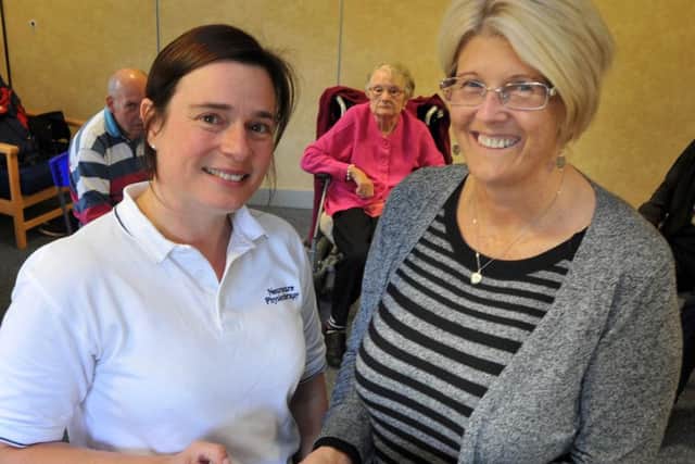 Feature on the Neuro Drop-In Centre at Lancaster Farms.
Sarah Jennings from Neurocare Physio presents a cheque for £750 to Centre Founder Sharon Jackson (right).  PIC BY ROB LOCK
12-10-2015