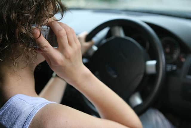 POSED BY MODEL

File photo dated 23/07/06 of a woman using his mobile phone while driving as fiercer fines are failing to stop motorists using hand-held mobile phones while driving, figures show. PRESS ASSOCIATION Photo. Issue date: Monday December 12, 2011. The number of offenders is now higher than the year just before harsher penalties were introduced, the statistics revealed. There were at least 171,000 fixed penalty notices (FPN) for mobile phone offences in 2010/11, according to Freedom of Information requests made to England and Wales police forces by insurance company swiftcover.com. With two of the 43 forces yet to respond, the 2010/11 figure was higher than the 166,800 total in 2006 - the year before the fine was doubled, with the threat of points going on to licences of offending drivers. The latest total was also more than double the figure of 74,000 in 2004. Swiftcover reported that Thames Valley Police had had an FPN increase of 21% in 2010/11 compared with 2009/10. Other increases included Hamp