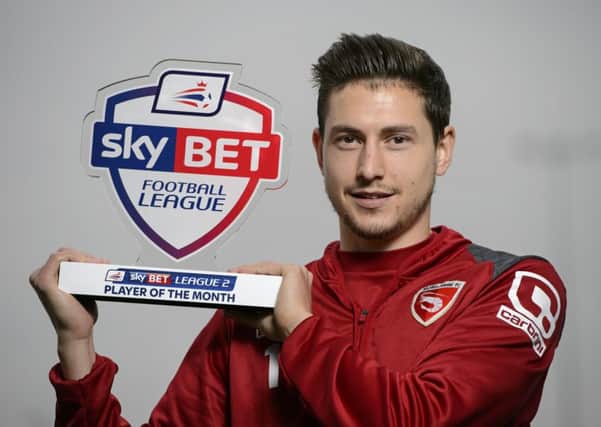 Morecambe's Shaun Miller with his trophy. Picture: Matthew Pover