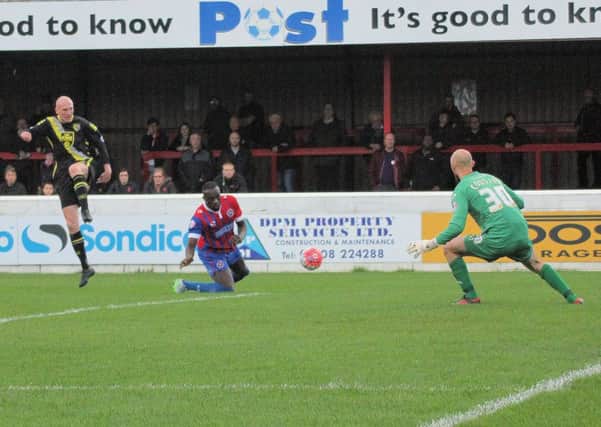 Kevin Ellison goes for goal in the first game at Dagenham.