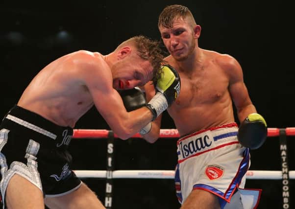 Isaac Lowe (right) on his way to claiming a ninth round stoppage win against Jamie Speight. Picture: Dave Thompson/PA Wire.