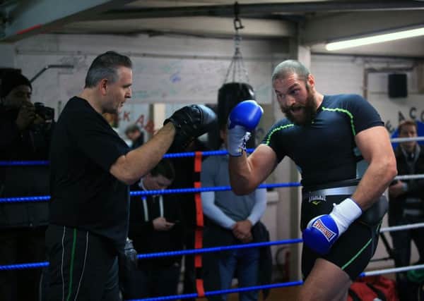 Tyson Fury being trained by Peter Fury. Photo: Nick Potts/PA Wire