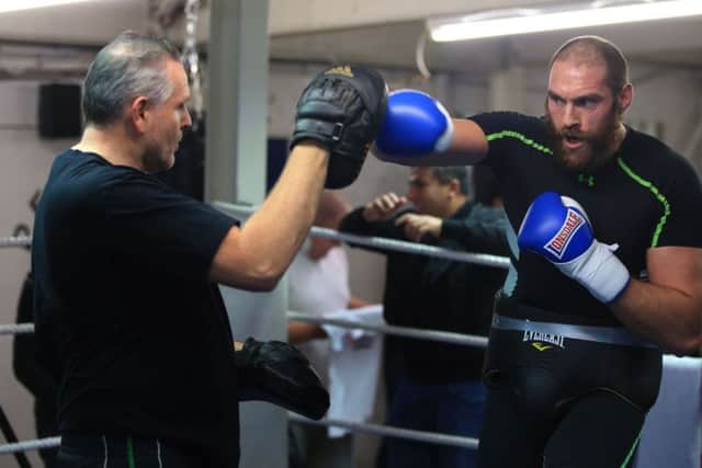 Peter Fury (left) and Tyson Fury (right).