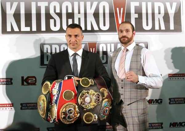 Wladimir Klitschko (left) and Tyson Fury during a press conference. Photo: Simon Cooper/PA Wire.