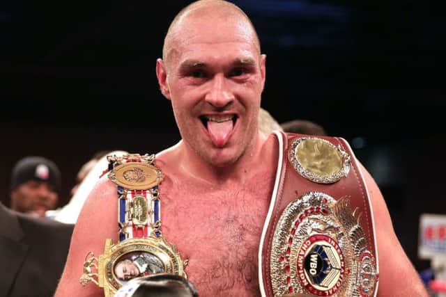 Tyson Fury celebrates beating Dereck Chisora for the European Title in November 2014. Photo credit should read: Nick Potts/PA Wire