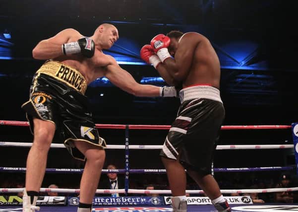 Tyson Fury and Dereck Chisora trade punches in their November 2014 fight. PRESS ASSOCIATION Photo. Picture date: Saturday November 29, 2014. See PA story BOXING London. Photo credit should read: Nick Potts/PA Wire