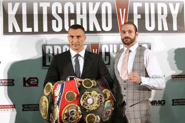 Wladimir Klitschko (left) and Tyson Fury during a press conference at the Hilton Syon Park, London. PRESS ASSOCIATION Photo. Picture date: Wednesday September 23, 2015. See PA story BOXING Fury. Photo credit should read: Simon Cooper/PA Wire.