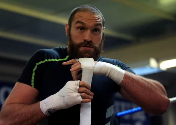Tyson Fury has threatened to pull out of his fight with Wladimir Klitschko unless he can wear his preferred gloves. Nick Potts/PA Wire