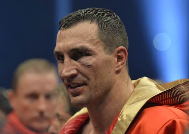 Wladimir Klitschko sports cuts in his face after losing toTyson Fury. AP Photo/Martin Meissner
