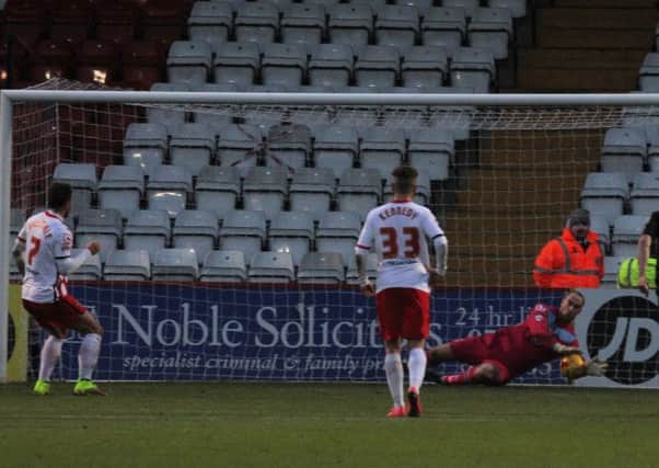 Barry Roche saves a penalty.