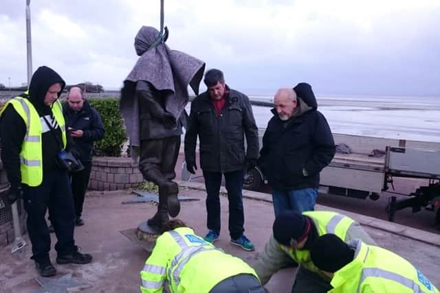 Graham Ibbeson supervises the return of the Eric Morecambe Statue in December 2014.