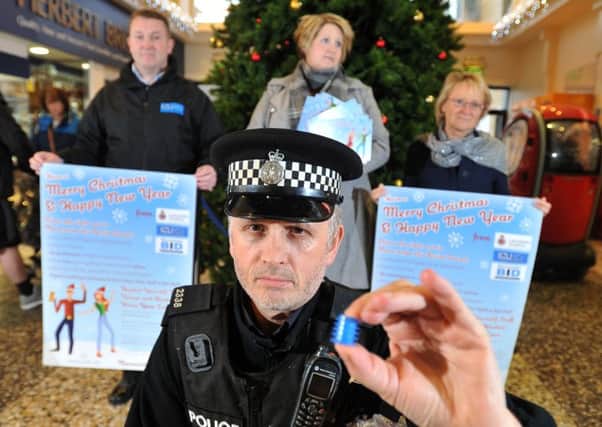 Photo Neil Cross: PC Andy Taylor, Sue Byers of the Arndale Centre, Brendan Hughes of ICU and Vicky Lofthouse of BID launching a campaign to promote Morecambe as a safe place to drink at Christmas