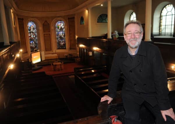 Bruce Crowther at St John's Church in Lancaster where he is setting up the Fig Tree, formally situated in Garstang