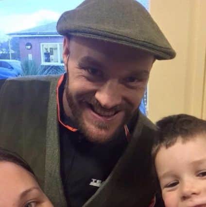 Tyson Fury popped in to the Morecambe Road School Christmas fair and posed for this photo with Amanda Bradley and her son Alfie.