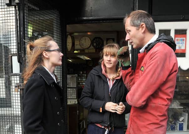 Aftermath of the unprecedented flooding over the weekend in Lancaster.
MP for Fleetwood and Lancaster Cat Smith talks to Anthony and Kimberley Gregg outside their flood-damaged premises, Cunningham Jewellers on Chapel Street.  PIC BY ROB LOCK
7-12-2015