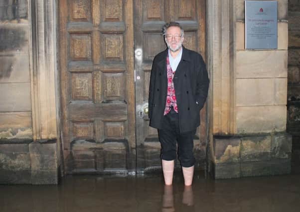 Bruce Crowther outside St John's Church which was badly affected by the recent floods. Picture: Richard Davis.