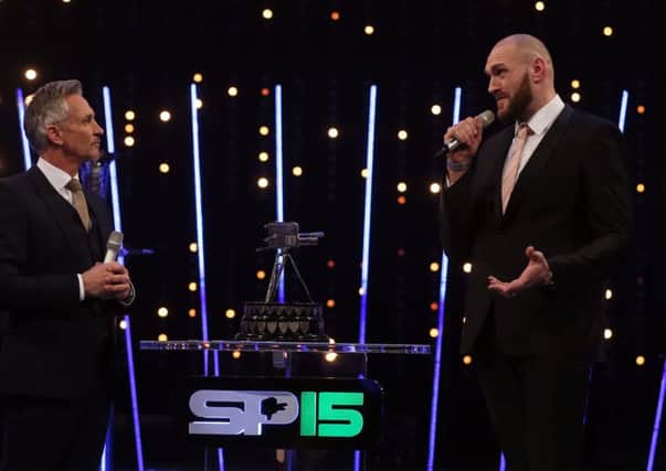 Tyson Fury speaks to Presenter Gary Lineker during Sports Personality of the Year 2015 at the SSE Arena, Belfast. PRESS ASSOCIATION Photo. Niall Carson/PA Wire