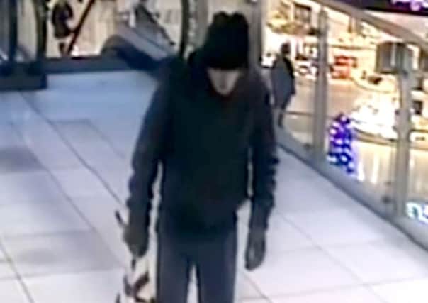 Police have issues CCTV footage of a suspect as they launch a manhunt after an IED bomb was found in the toilets of the Fishergate Shopping Centre