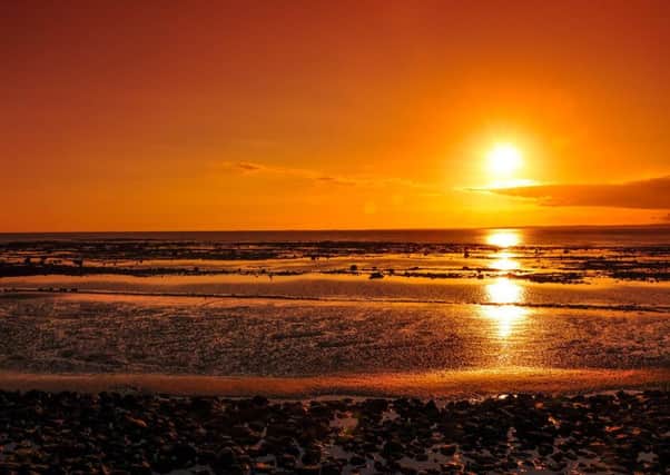 Morecambe Bay beach sunset. By  Russ Holt