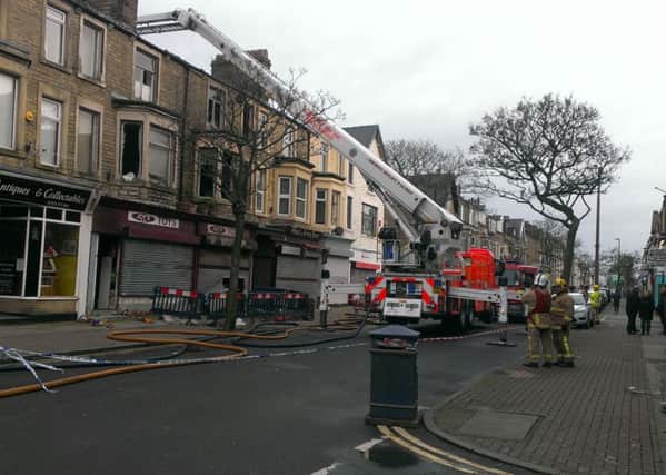 Firefighters were still at the scene of the toy shop fire on Albert Road on Thursday afternoon. Pic: Michelle Blade