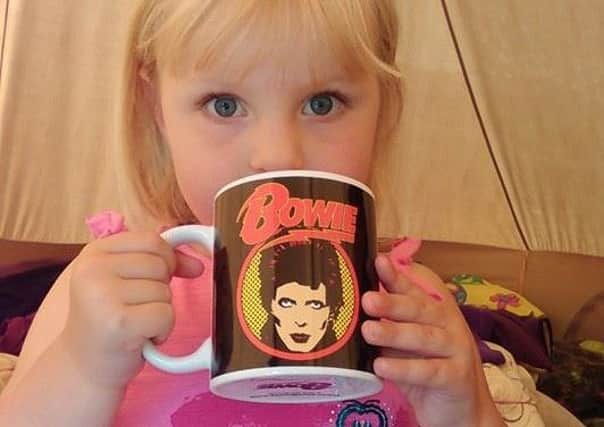 Zoe with her Bowie mug.