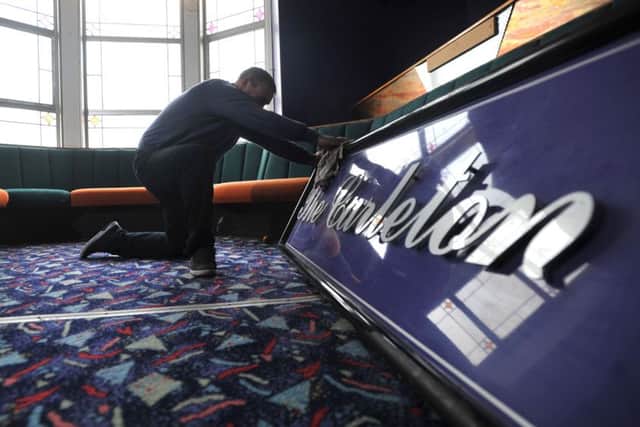 Photo Neil Cross: Getting the club ready for the one-night reopening.