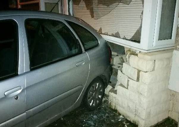 The car that smashed into a house in Heysham.