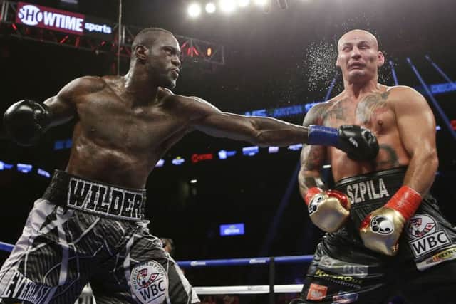 Deontay Wilder on the attack against Artur Szpilka. Picture: AP Photo/Frank Franklin II