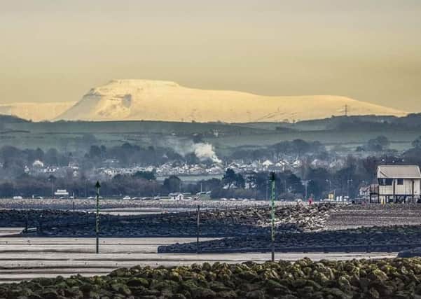 A snowy scene across Morecambe Bay by Mike Rowson.