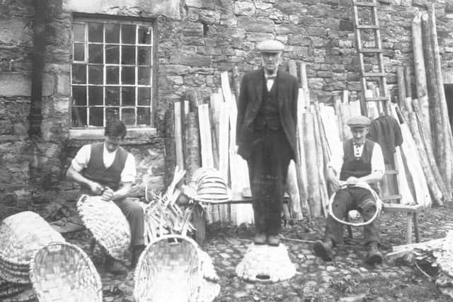 Wray was once home to the skilled craft of oak swill basket-making and here from the archives the gollowing passage details a visit to Mr John Singletons workshop at Wray by the Lancaster Gazette in 1932

John Singleton the Elder standing on a swill basket, circa 1932. John Singleton the Third is known to have said in the latter part of his life: My grandfather would come over to my dess (stack) of swills and knock it over. He would take the weakest looking swill and stand on it. If it didnt take his weight I was in trouble
