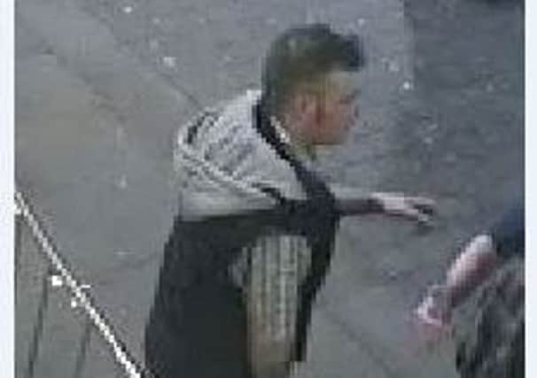 The man police wish to speak to in connection with an assault on Cheapside, Lancaster, in December.