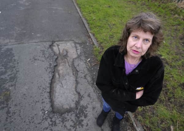 Maggie Milner is fed up with all the potholes near her home on South Road, Morecambe