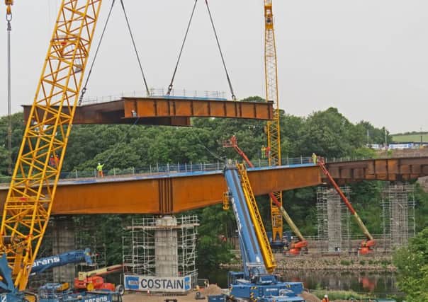 One of the last sections of the Lune West Bridge being put into place on the Heysham to M6 link road.
