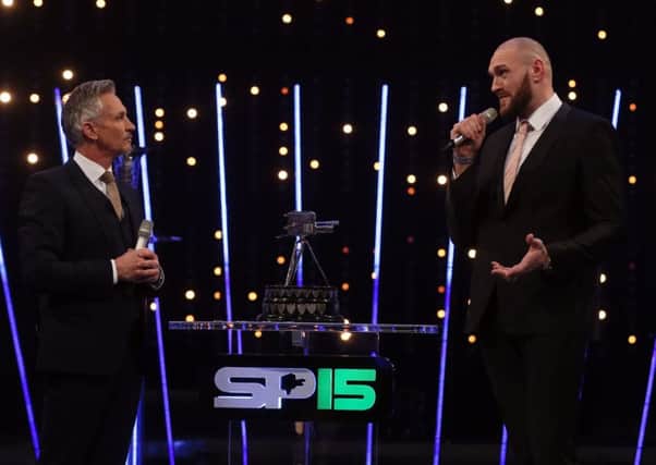 Tyson Fury speaks to presenter Gary Lineker during Sports Personality of the Year. Picture: Niall Carson/PA Wire