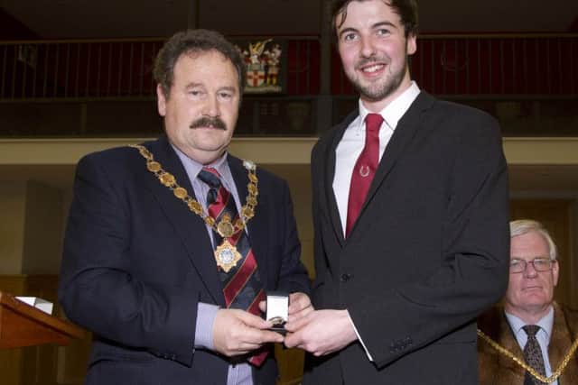 Myerscough stundet Tom Holliday receives his farriery award