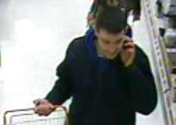 Police want to trace this man in connection with two thefts from Sainsbury's in Morecambe.