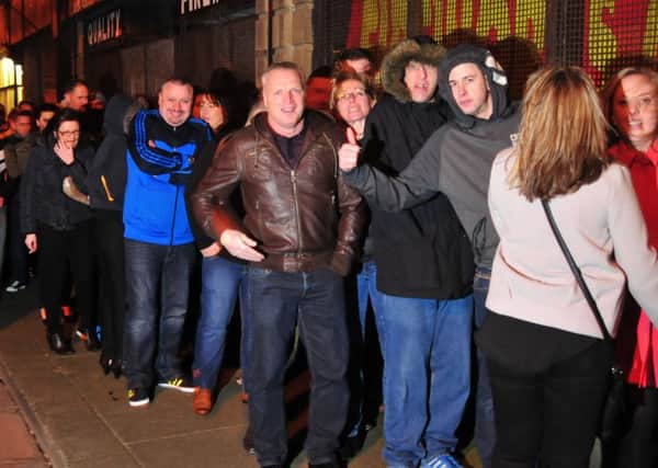 Photo: David Hurst: A sold out crowd brave the winds to queue for entry into the iconic Morecambe venue, The Carleton, as it goes out with a bang, holding one last sold out night before closing to be converted into flats.