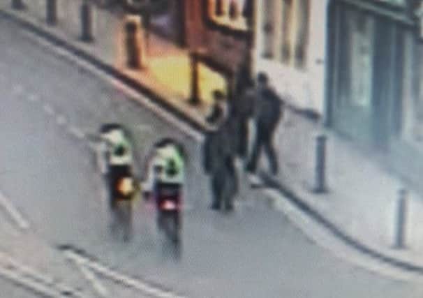Police want to speak to these two cyclists after an incident involving a group of schoolchildren.