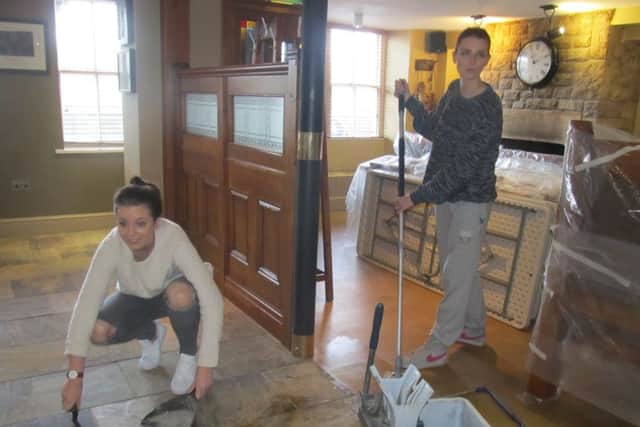 Charlotte and Jess House, staff cleaning up at the Wagon and Horses in Lancaster. Picture by Gemma Sherlock