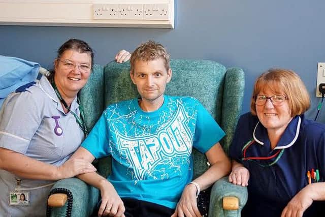 Senior registered nurse Louise Yates (left) and ward sister  Debbie Allan with Ian.