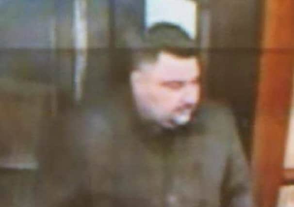 Police want to speak to this man after a theft from a pub.