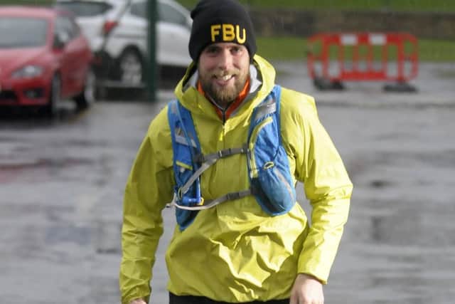 Ben Smith running a marathon in Blackpool as part of his charity marathon challenge