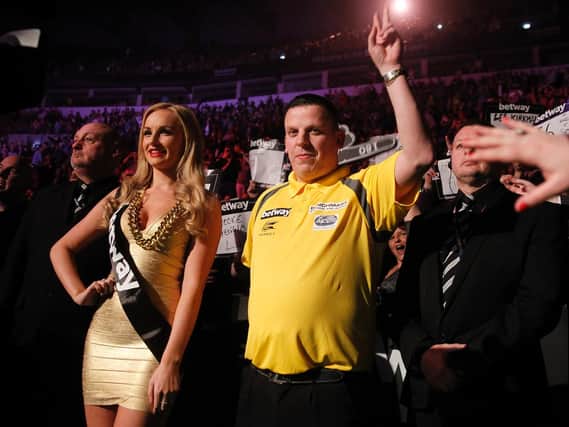 Dave Chisnall makes his entrance in Leeds. Picture: Lawrence Lustig/PDC