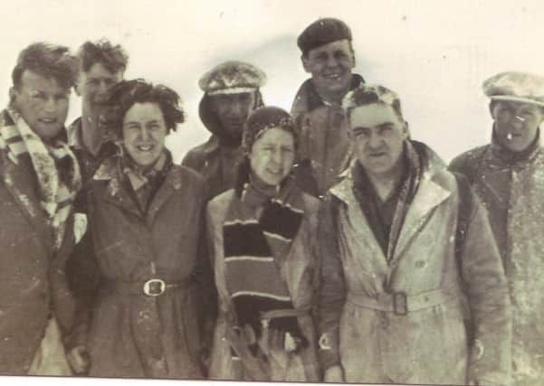 Top of Helvellyn 1934. Muriel in the middle. Anybody recognise the men?