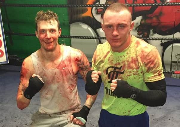 Reece MacMillan, right, after a tough sparring session with Danny Mickleburgh.