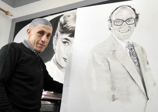 Rob Newbiggin working on the Eric Morecambe portrait before its unveiling last year.