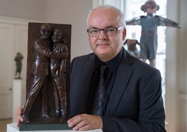 Gary Morecambe, Eric Morecambe's son, with a bronze miniature of Eric and Ernie. A sculpture at Blackpool Winter Gardens, originally planned for Morecambe, and a replacement Morecambe and Wise heritage trail in Morecambe will be based on this design.