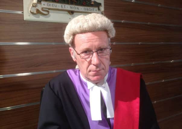 Stephen Tomlin as a judge in Hollyoaks
